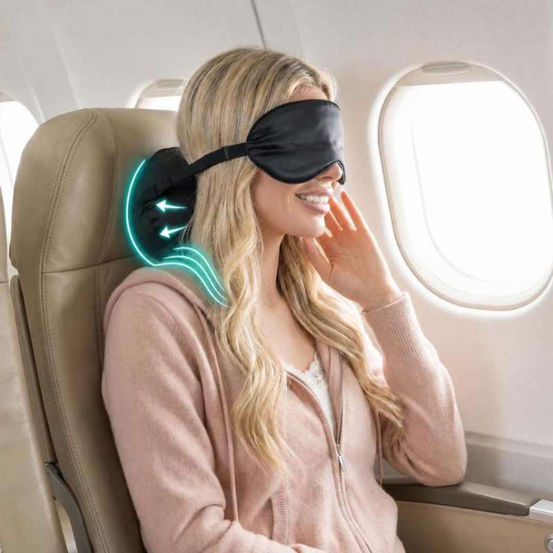 Silk travel pillow with ergonomic neck support for comfortable sleep on long flights